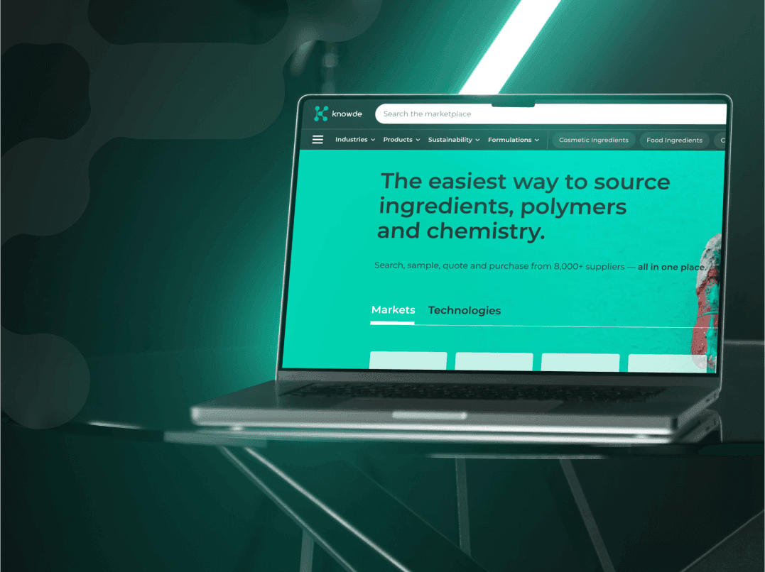A laptop with the Knowde application is on the screen.